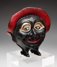 SAVE AND SMILE MONEY BOX CAST IRON STILL BANK.