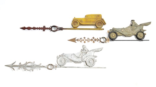 THREE FIGURAL LIGHTNING ROD DIRECTIONALS WITH AUTOMOBILES.