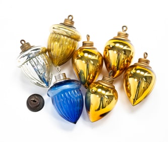 SEVEN LIGHTNING ROD GLASS PENDANTS.