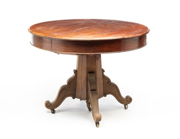 ROUND EXTENSION PEDESTAL TABLE.