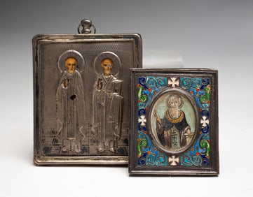 TWO SILVER RELIGIOUS ICONS.