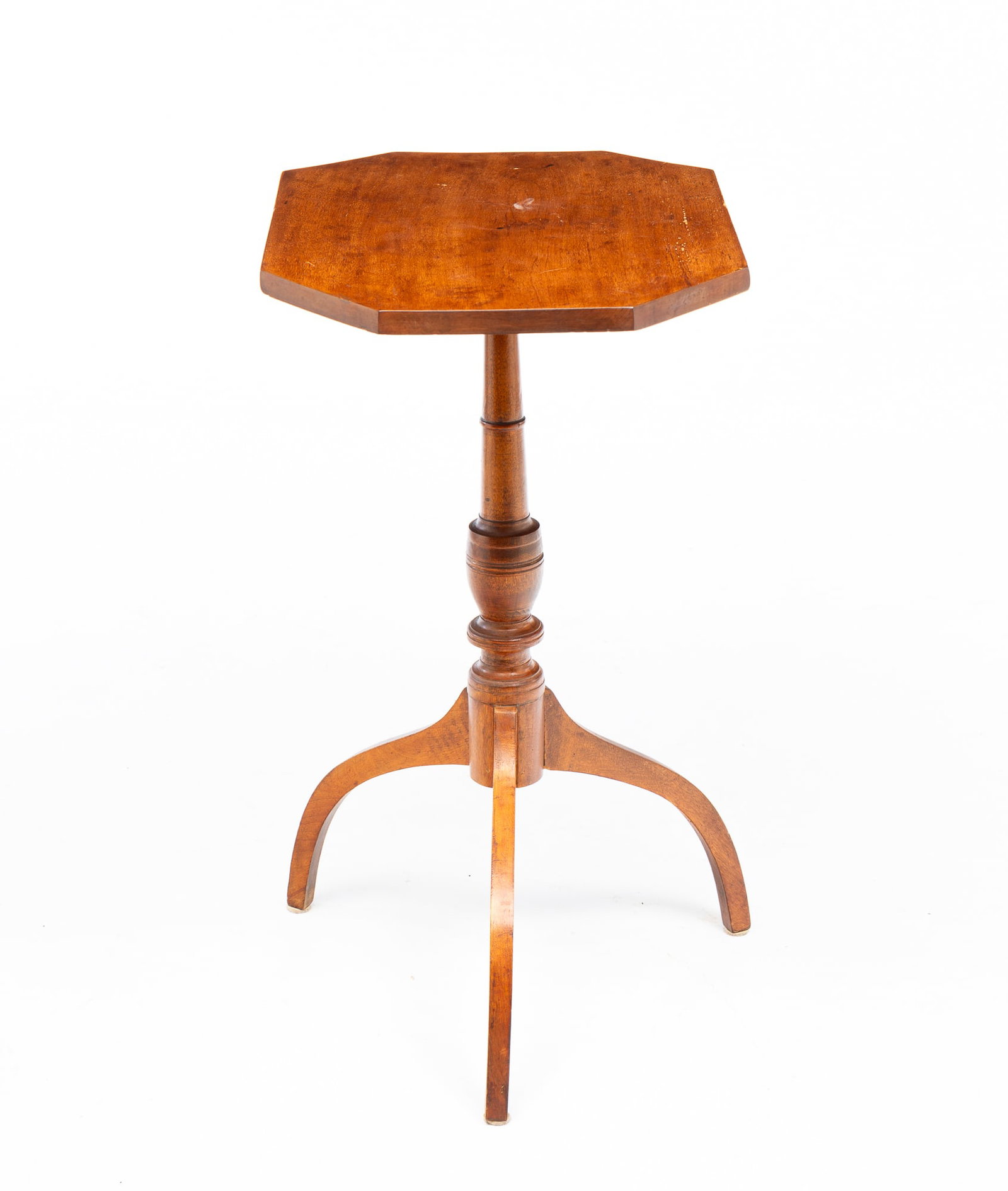 TILT TOP CANDLE STAND.: American, circa 1800. Birch. Rectangular top with cut corners, turned column and scimitar legs. 28.5"h. 21"w. 15"d.From the collection of the late Neil Zuehlke, Heartland, Wisconsin.