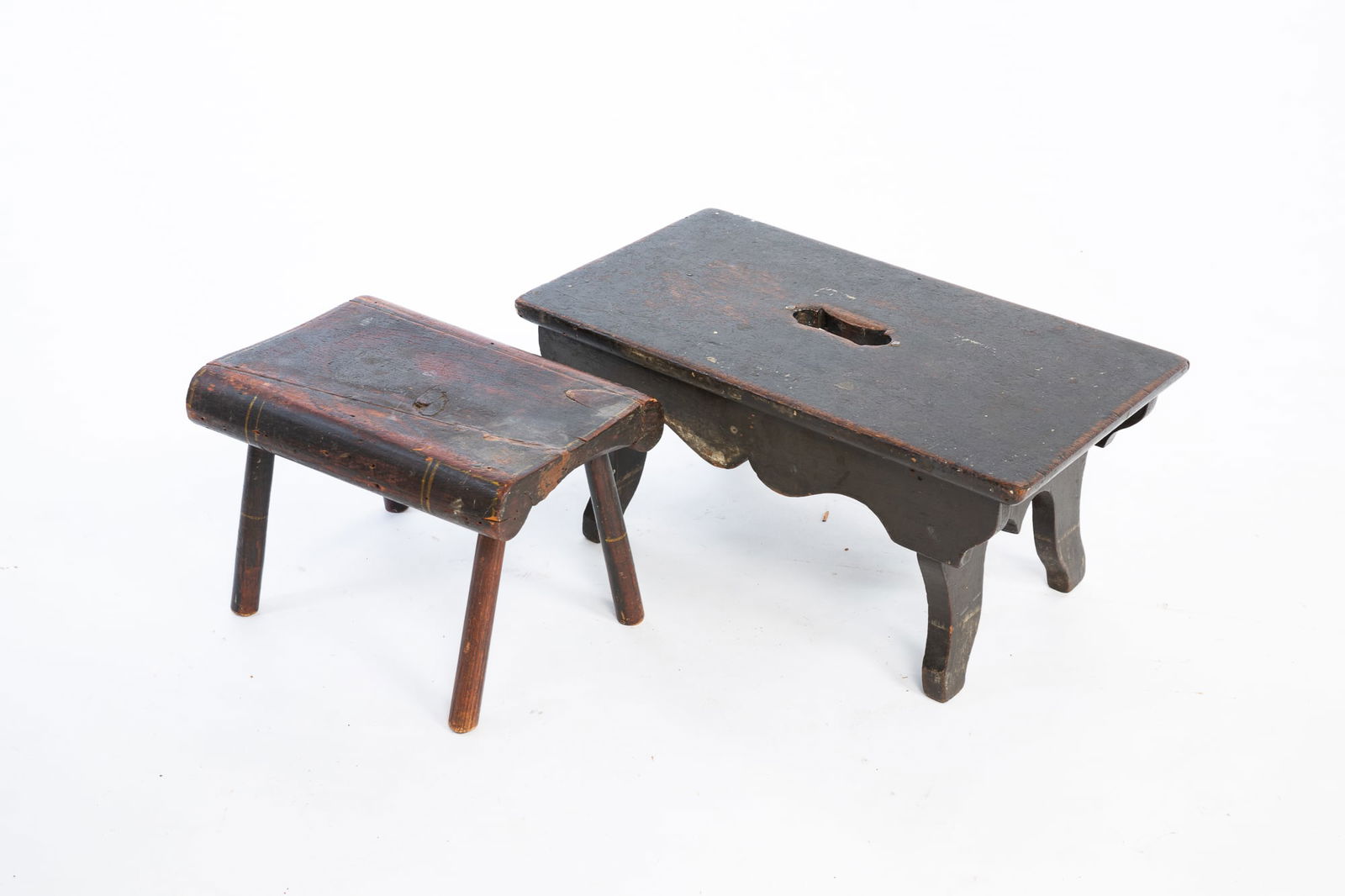 TWO WOOD FOOT STOOLS. (1 of 2)