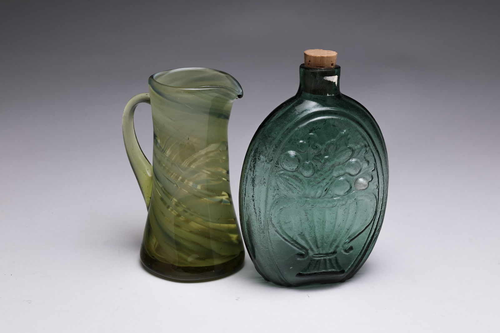 PICTORIAL GLASS FLASK AND ART GLASS PITCHER. (1 of 3)