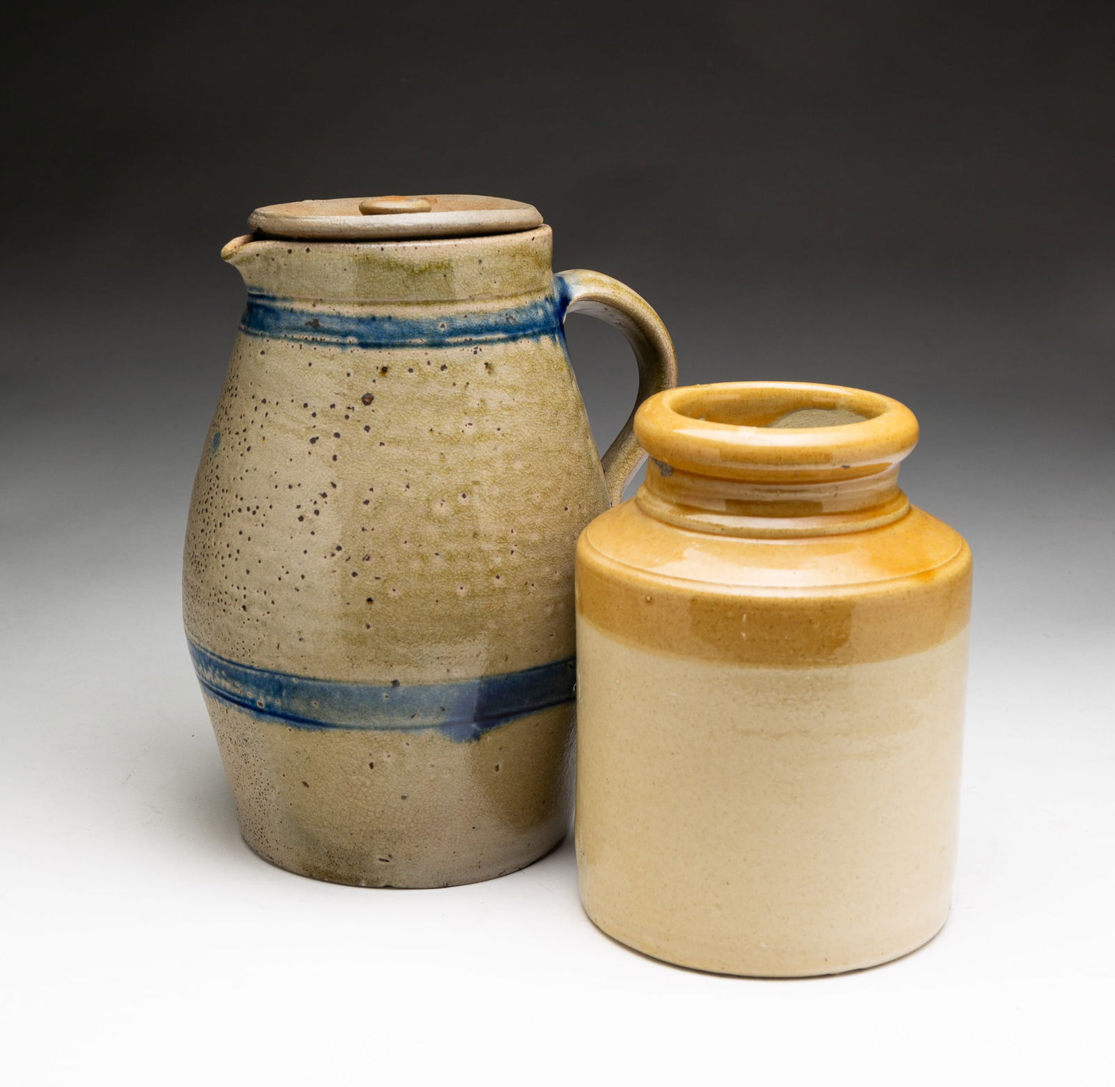 TWO STONEWARE VESSELS. (1 of 3)
