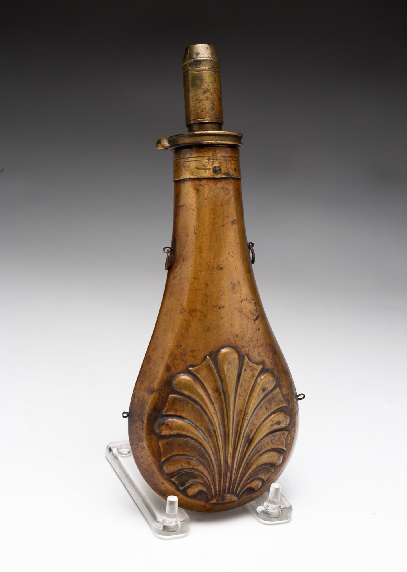 BRASS POWDER FLASK. (1 of 2)