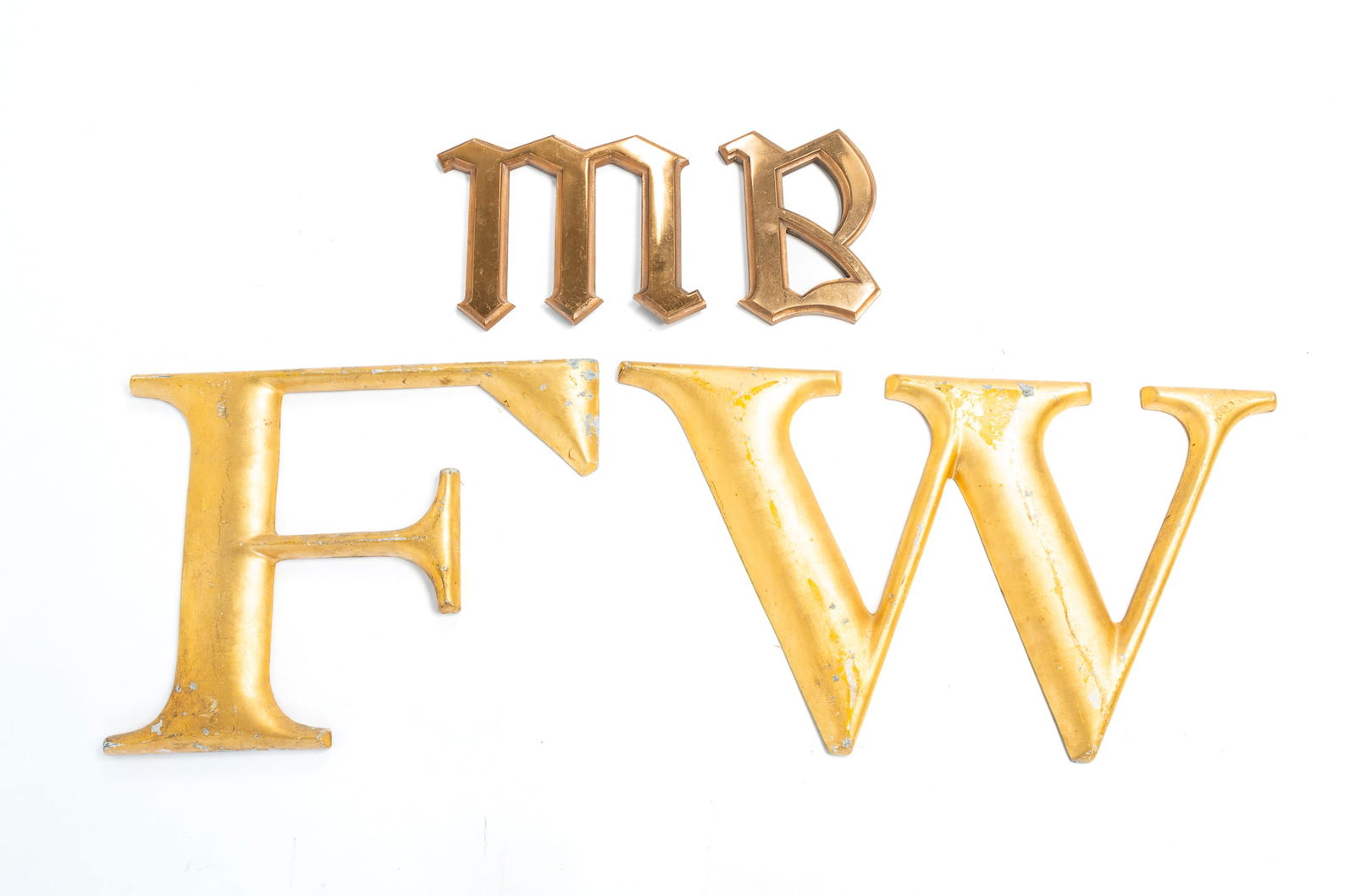 FOUR CAST METAL LETTERS. (1 of 4)