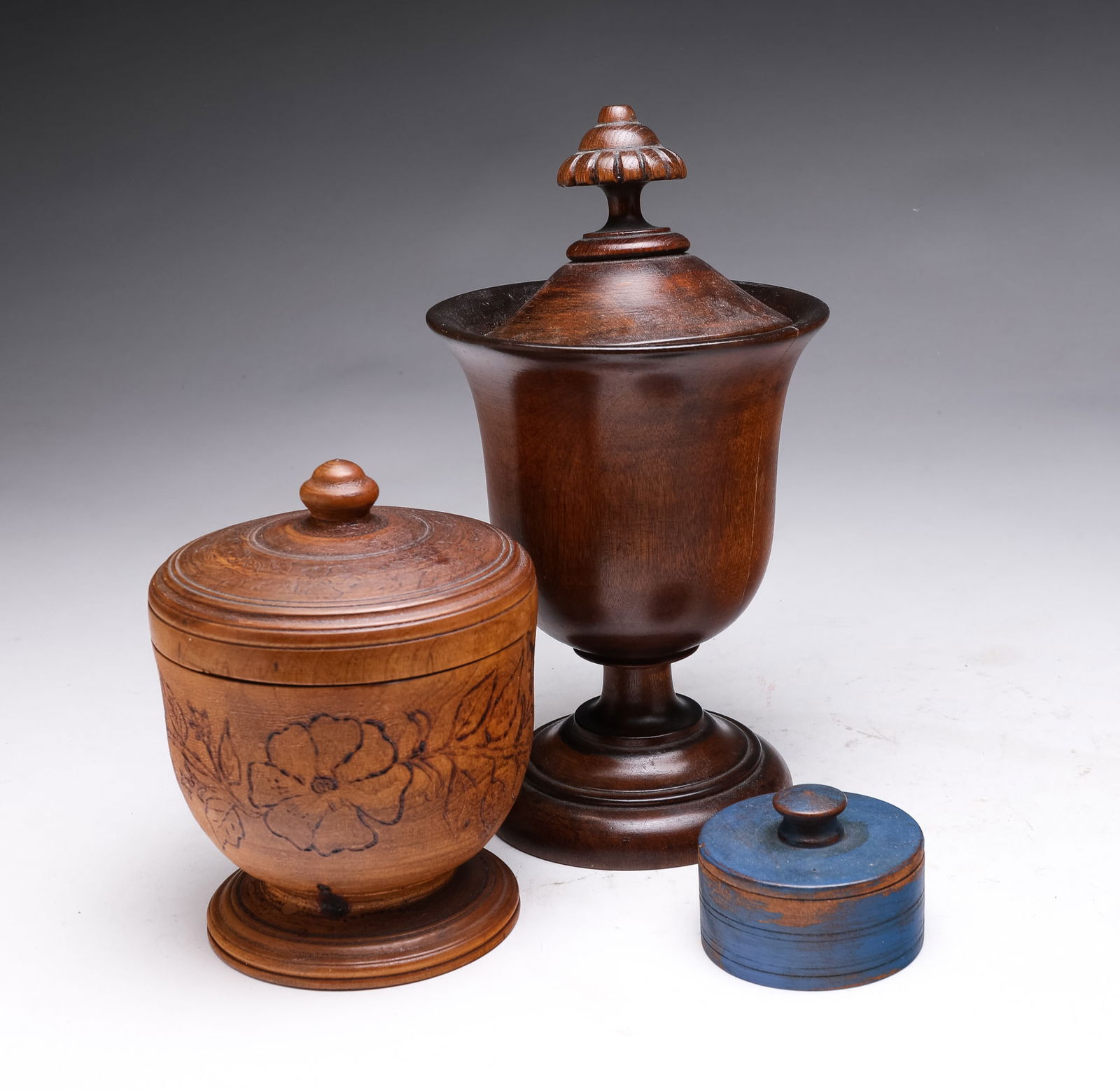 THREE TREENWARE JARS. (1 of 2)