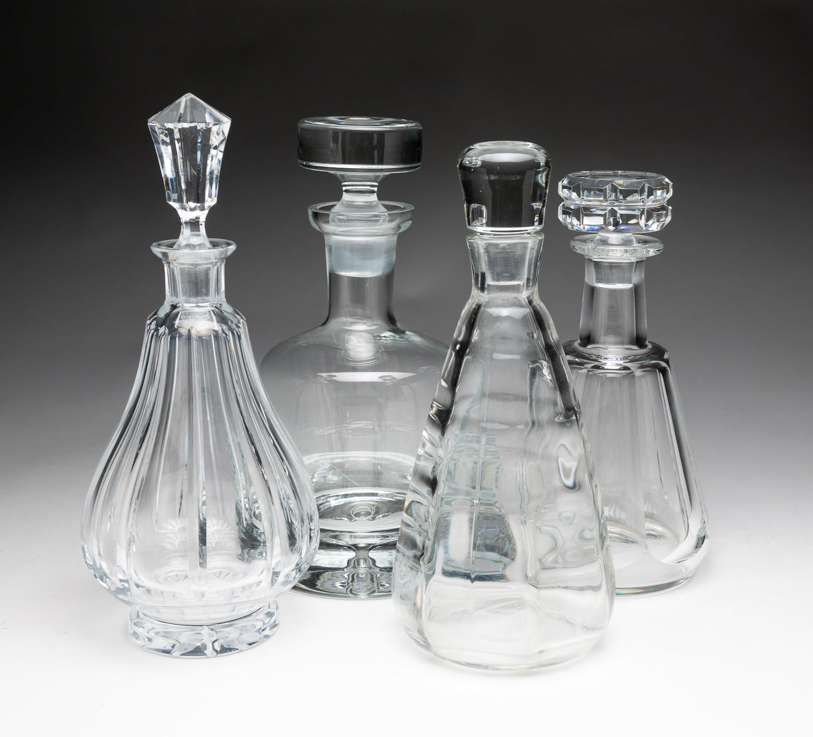 FOUR CRYSTAL DECANTERS, ONE MARKED BACCARAT. (1 of 5)
