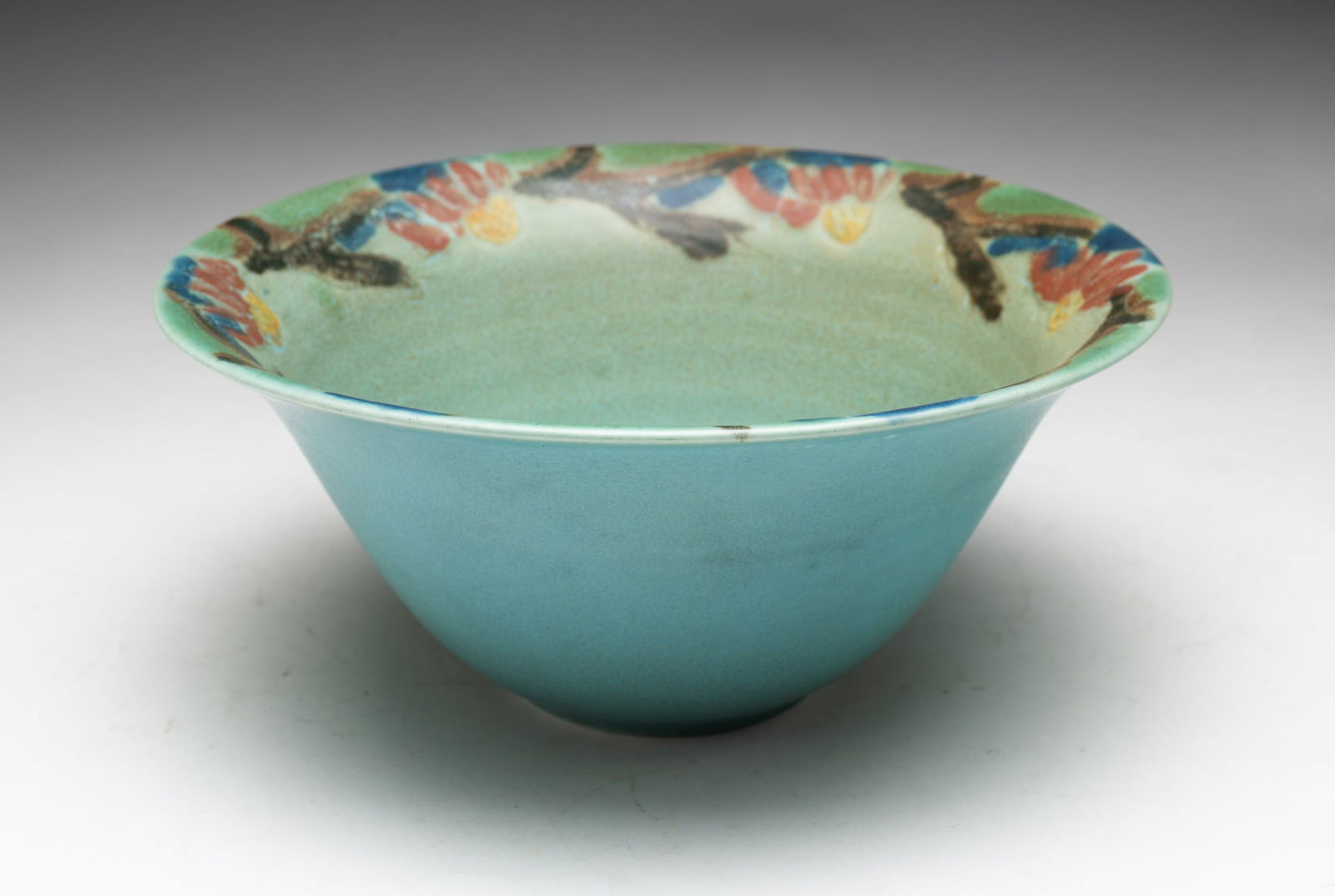 1920 ROOKWOOD ART POTTERY BOWL SIGNED LOUISE ABEL.: American (Cincinnati, Ohio), 1920. Bowl with flared top rim decorated with a polychrome floral border on an allover matte turquoise glaze. Signed by Louise Abel and with Rookwood XX 2287 mark on under