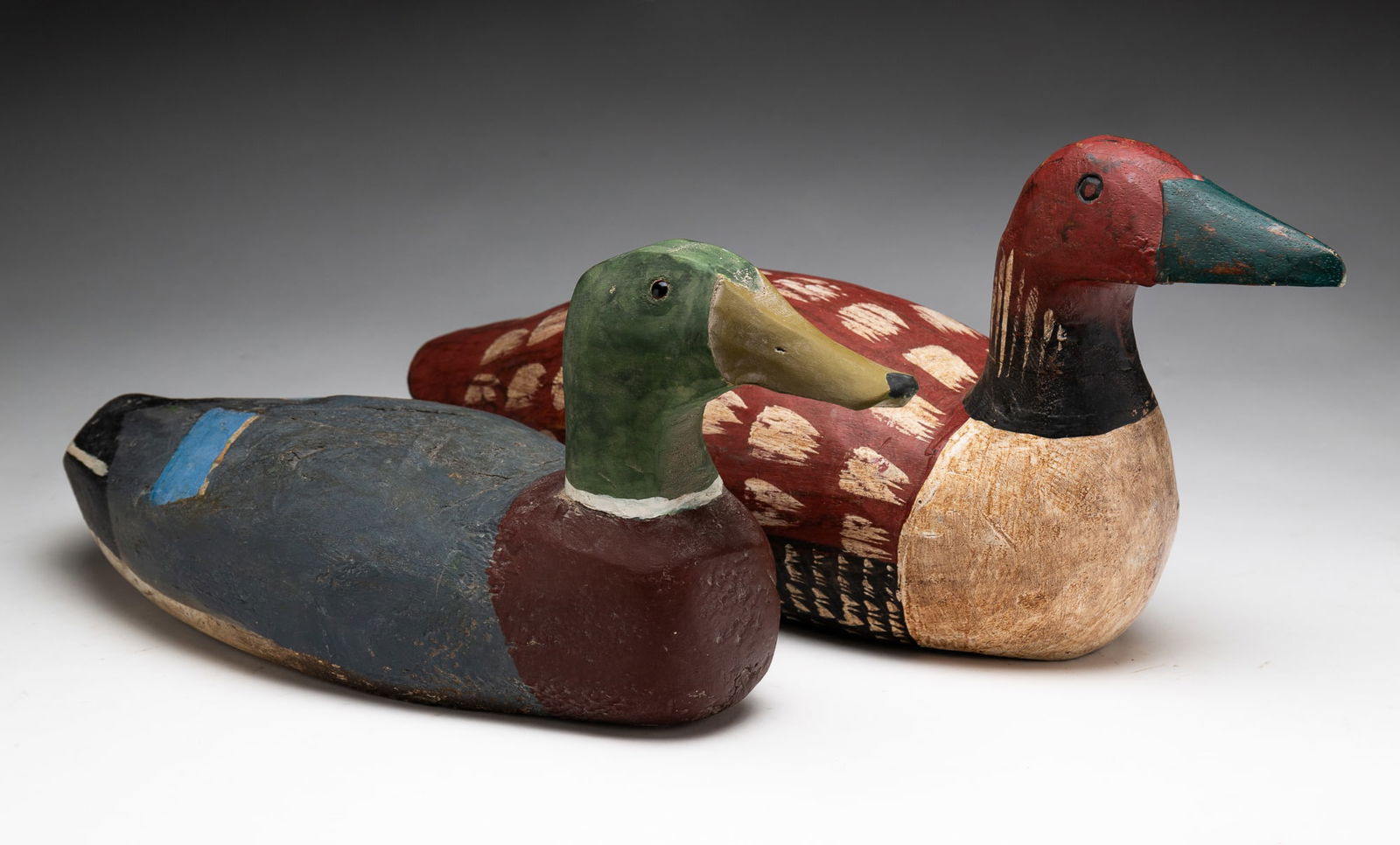 TWO PAINTED AND CARVED DUCK DECOYS. (1 of 6)
