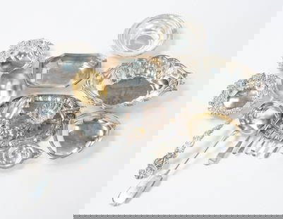 STERLING SILVER TABLE ACCESSORIES.: American, Mexican and English, Includes an ornate Gorham ladle, Reed and Barton scalloped rim dish, nut dishes, tea strainers, bowls and five Hester Bateman and Sons spoons. Approximately 51.92 ozt. *