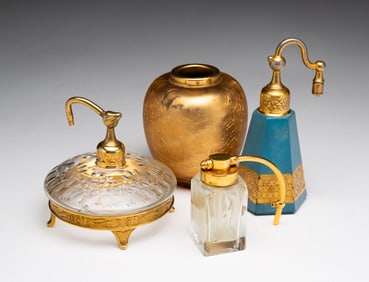 SET OF FOUR PERFUME CONTAINERS BY DEVILBISS.