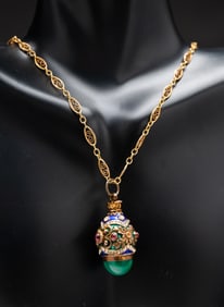 14K YELLOW GOLD NECKLACE WITH FABERGE STYLE EGG PENDANT.