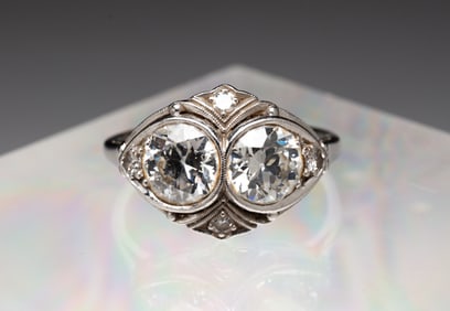 PLATINUM AND DIAMOND COCKTAIL RING.