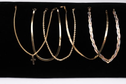 FIVE 14K YELLOW GOLD BRACELETS.