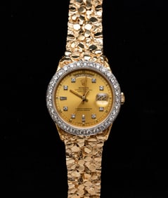 MEN'S 14K YELLOW GOLD AND DIAMOND ROLEX PRESIDENTIAL WATCH.