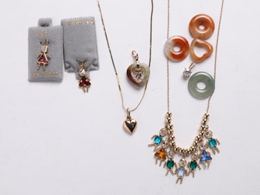 14K YELLOW GOLD NECKLACES AND GEMSTONE PENDANTS.