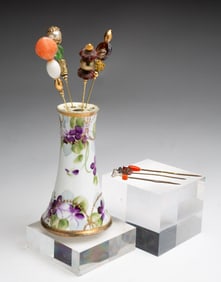 NORITAKE PORCELAIN HAT PIN HOLDER WITH EIGHT PINS.