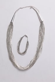 NATIVE AMERICAN LIQUID SILVER NECKLACE AND BRACELET.