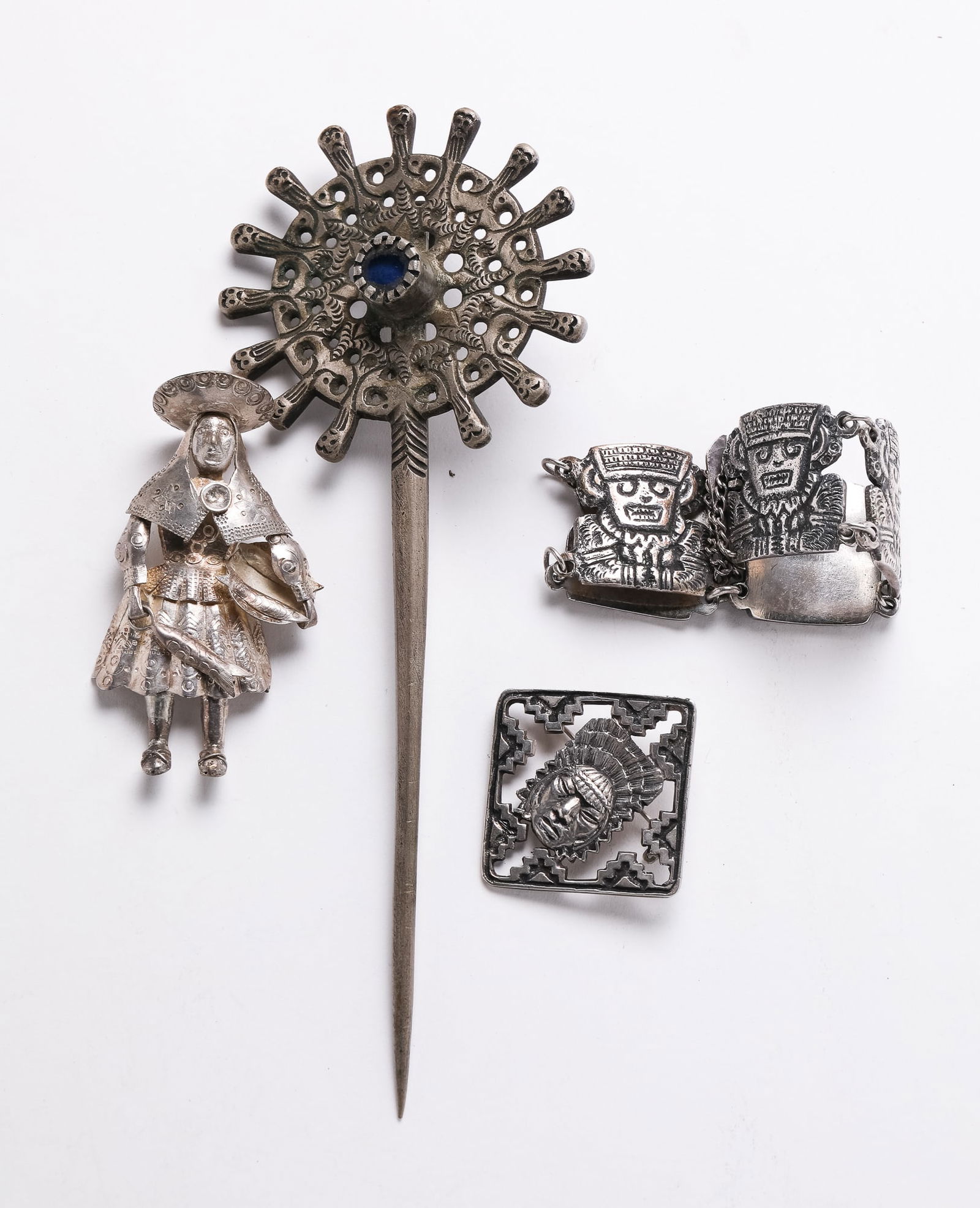 FOUR METAL INCA ITEMS. (1 of 2)