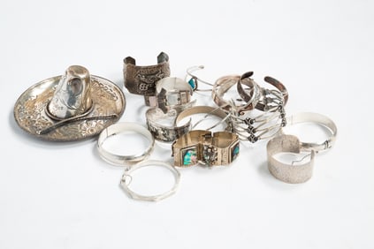 GROUP OF STERLING SILVER BRACELETS.