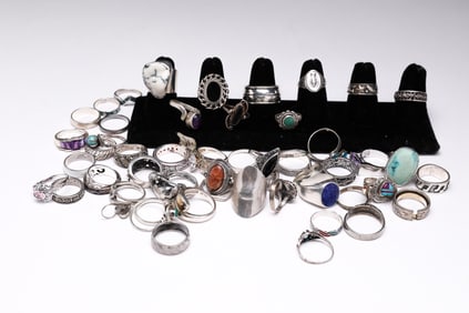 STERLING SILVER RINGS.