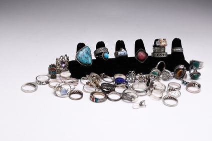 STERLING SILVER RINGS.