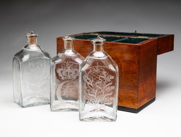 SET OF CASED BOTTLES.