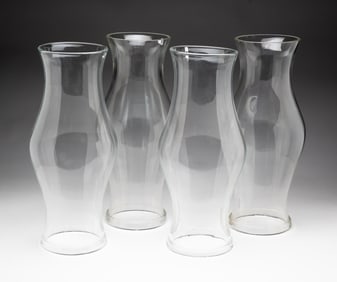 FOUR BLOWN GLASS HURRICANES.