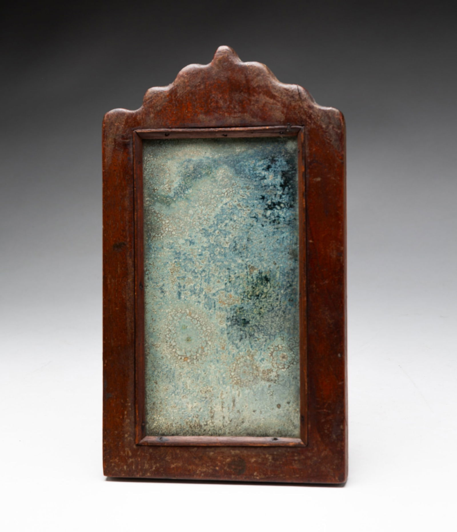 EARLY FRAGMENT MIRROR CARVED FROM A SINGLE PIECE OF WOOD. (1 of 10)