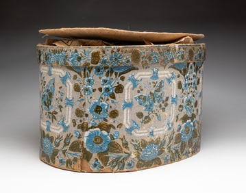 WALLPAPER COVERED BAND BOX WITH ORIGINAL LABEL.