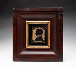 HOLLOW-CUT SILHOUETTE OF A GENTLEMAN.