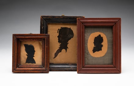 THREE FRAMED HOLLOW CUT SILHOUETTES.