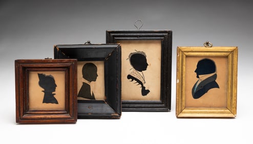 FOUR FRAMED FINE HOLLOW-CUT SILHOUETTES.