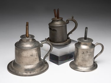 THREE PEWTER CAMPHENE OIL LAMPS.