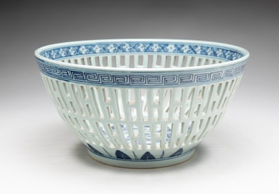 BLUE AND WHITE CANTON RETICULATED DEEP BOWL OF UNUSUAL FORM.