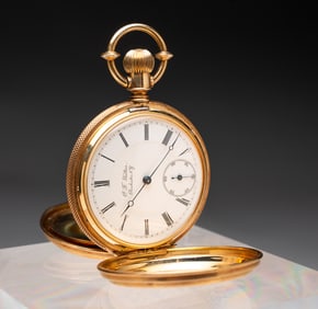 A C.F. WALTERS HUNTING CASE POCKET WATCH.