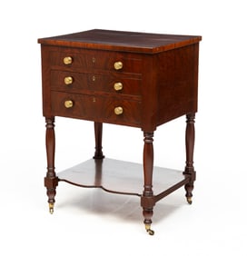 SHERATON MAHOGANY THREE DRAWER STAND.