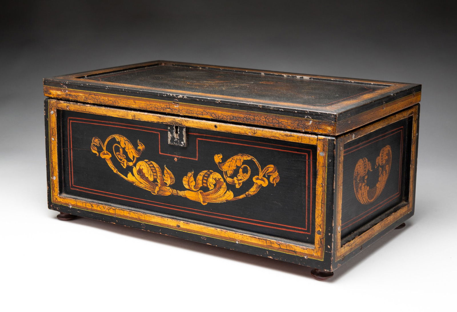 PAINTED AND DECORATED MINIATURE BLANKET CHEST. (1 of 5)