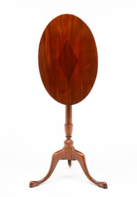 TILT TOP MAHOGANY CANDLESTAND.