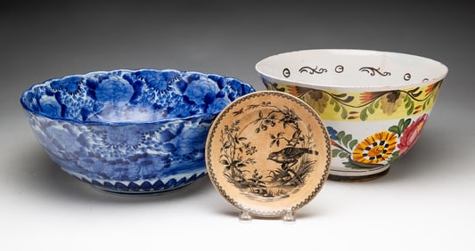 TWO LARGE DECORATED PORCELAIN BOWLS AND A TRANSFERWARE DISH.
