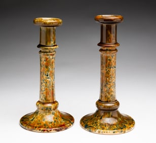 ROCKINGHAM FLINT GLAZE BENNINGTON CANDLESTICKS.