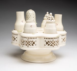 SCARCE RETICULATED CREAMWARE CASTOR SET.