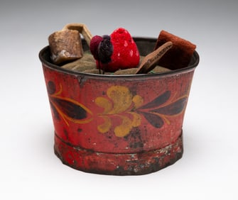 RED PAINTED TINWARE PIN CUSHION.