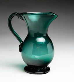 PEACOCK GREEN FLINT GLASS CREAM PITCHER.
