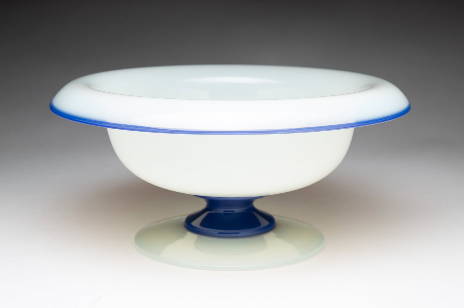 UNSIGNED FRY FOVAL OPALWARE GLASS CONSOLE BOWL.: American, early 20th Century. Opalene, flared rim with blue alabaster rim and stem. Polished pontil. 4.5"h. 9.75"d.
