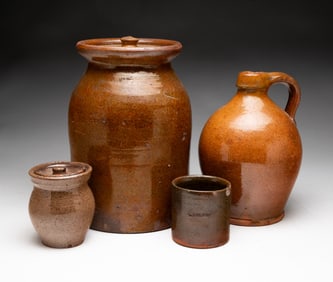 FOUR REDWARE VESSELS.