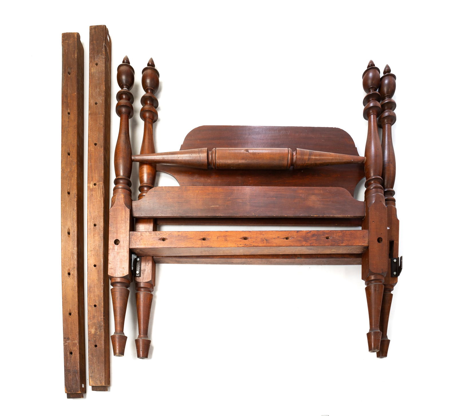 COUNTRY EMPIRE FOUR POSTER ROPE BED.: Americon, 19th Century. Cherry, poplar, and maple. Turned posts with urn finials, headboard with shaped crest and footboard with turned quilt rail. Retains original side rails and also has more modern