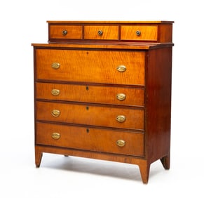 CHERRY AND TIGER MAPLE TRANSITIONAL CHEST OF DRAWERS.